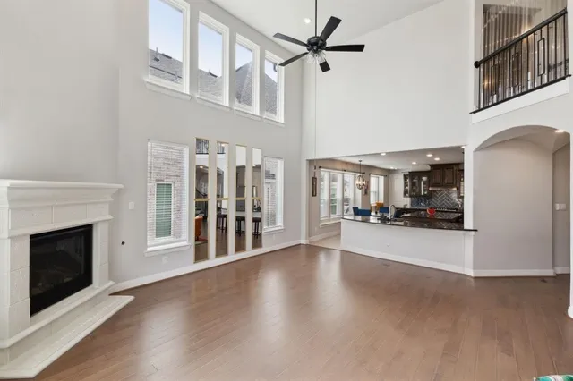 a view of an entryway with wooden floor
