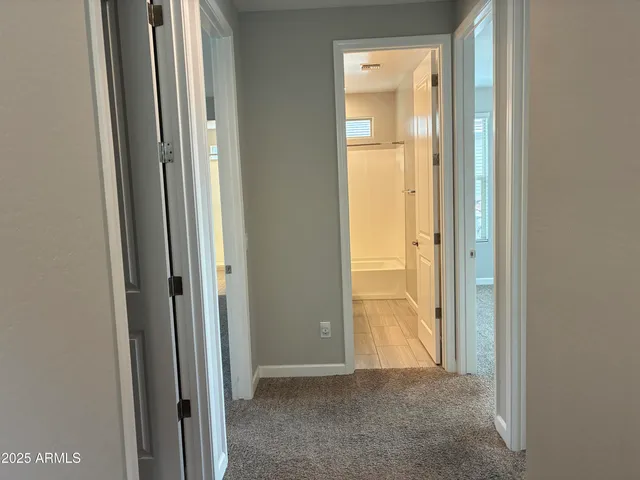 a view of a bathroom with a glass door
