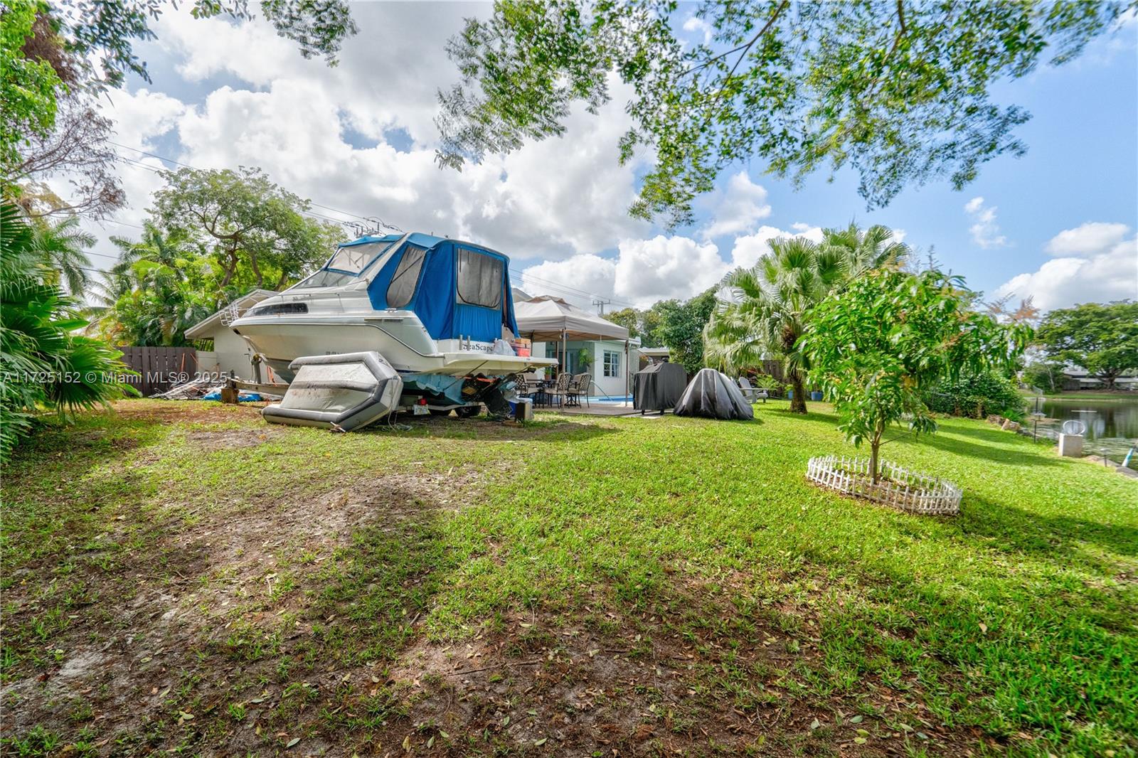 7271 Sunset Strip Sunrise, FL 33313 - Photo 11 of 45 a house view with a garden space