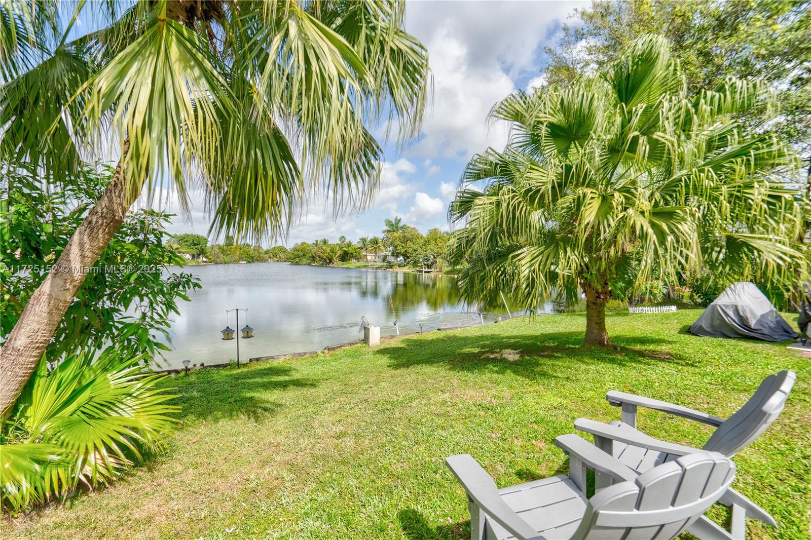 7271 Sunset Strip Sunrise, FL 33313 - Photo 12 of 45 a view of a chair and table in the garden