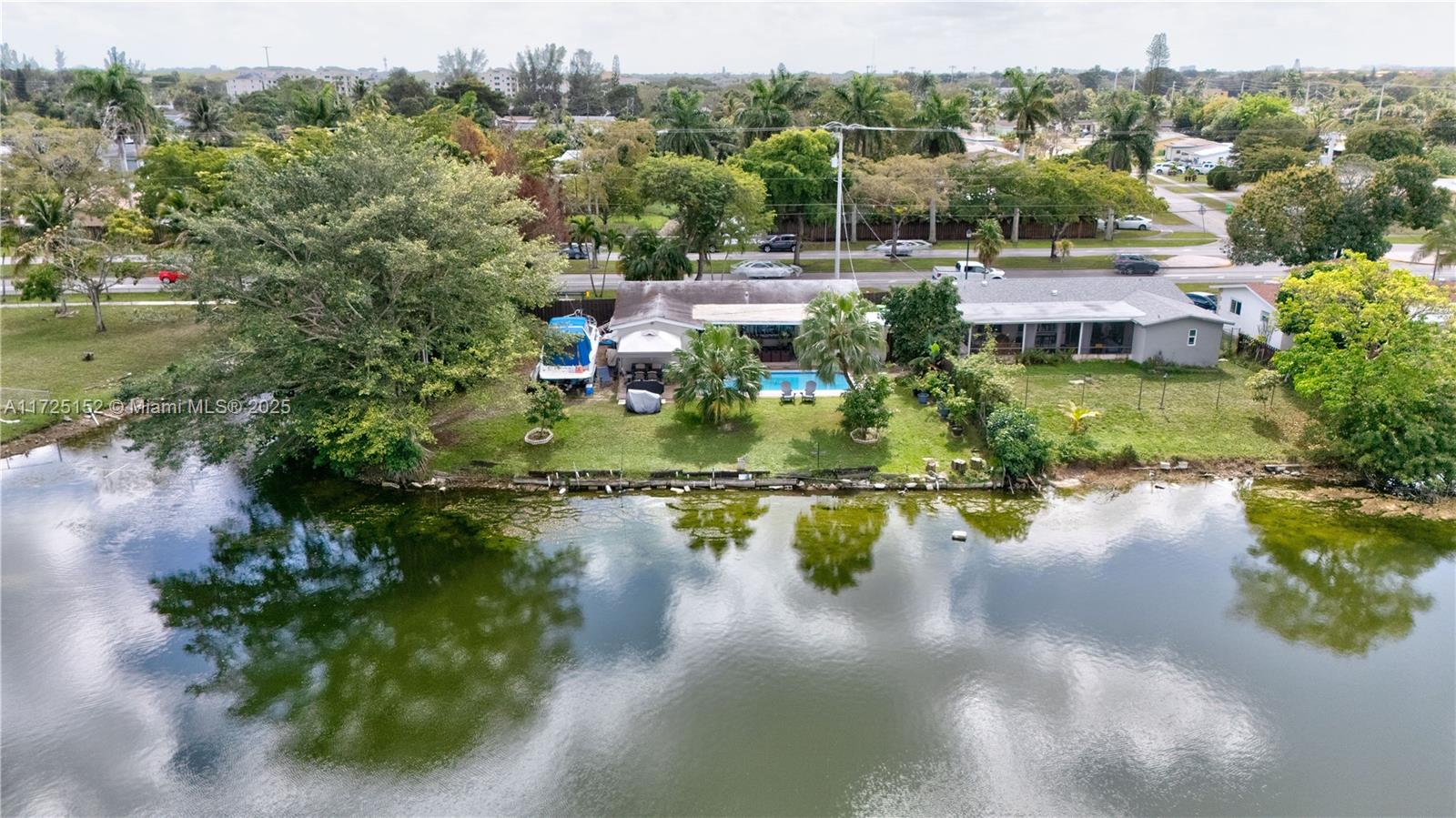 7271 Sunset Strip Sunrise, FL 33313 - Photo 2 of 45 a view of a lake with outdoor space