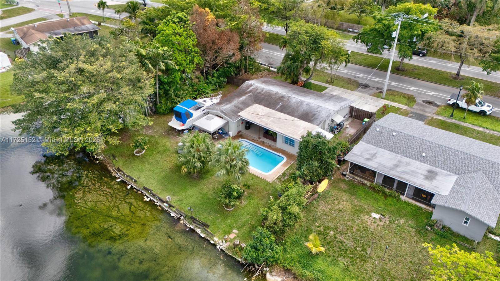 7271 Sunset Strip Sunrise, FL 33313 - Photo 37 of 45 an aerial view of a house with a yard basket ball court and outdoor seating