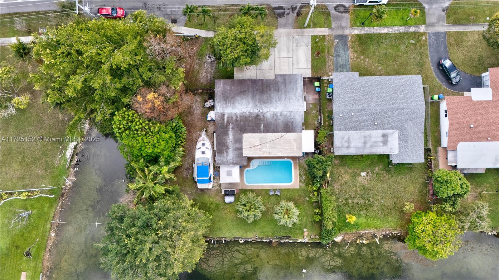7271 Sunset Strip Sunrise, FL 33313 - Photo 4 of 45 an aerial view of a house with a yard basket ball court and outdoor seating