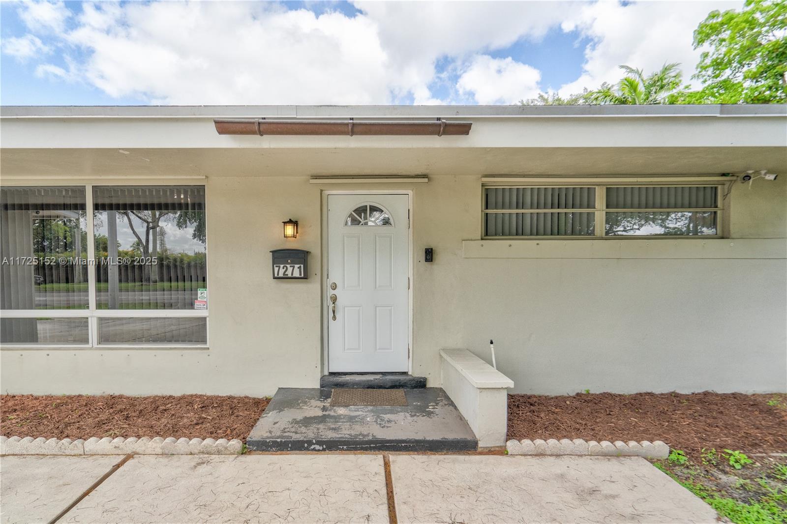 7271 Sunset Strip Sunrise, FL 33313 - Photo 45 of 45 a front view of a house