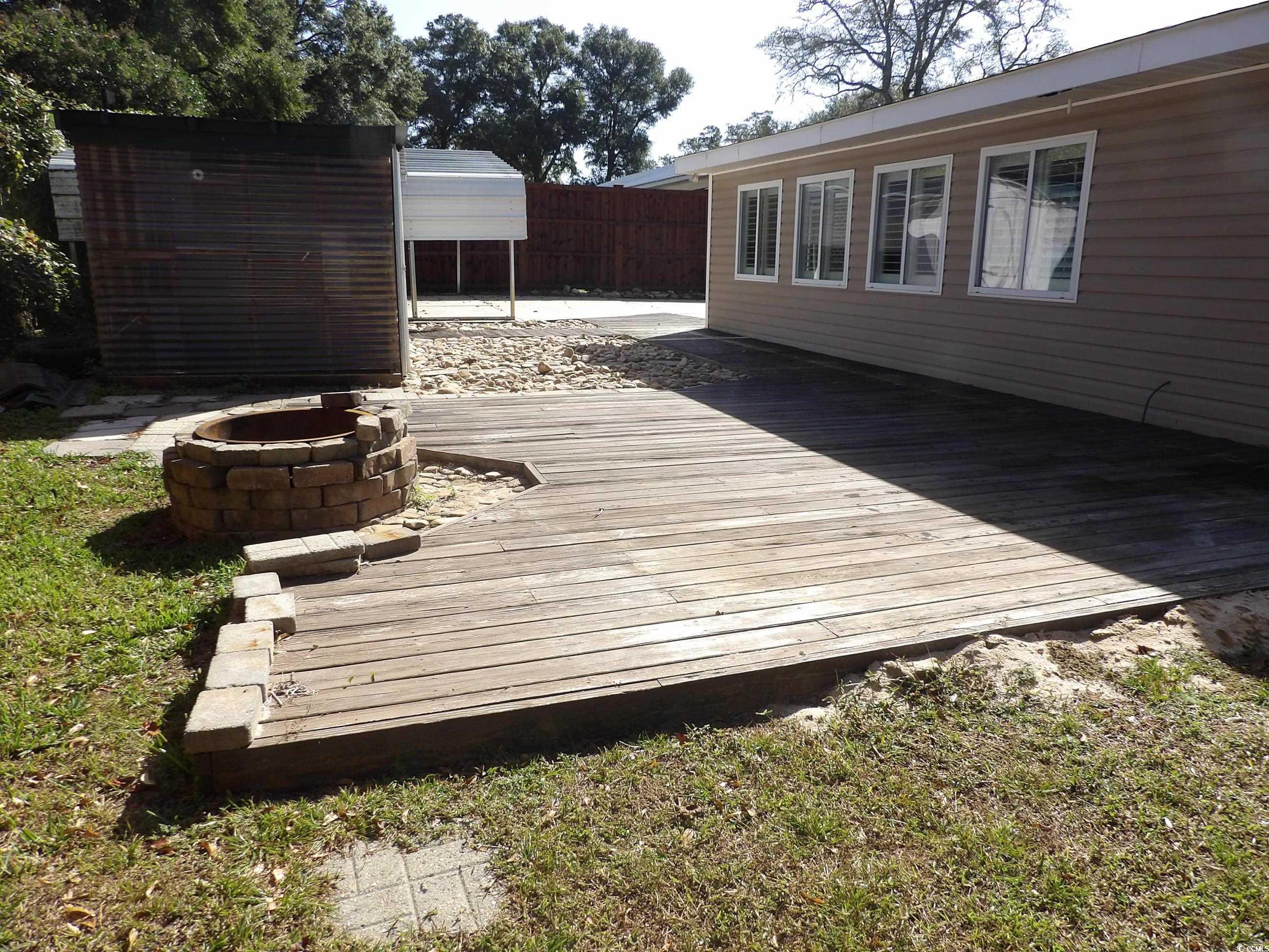 330 Stanley Drive Murrells Inlet, SC 29576 - Photo 26 of 32 View of wooden deck