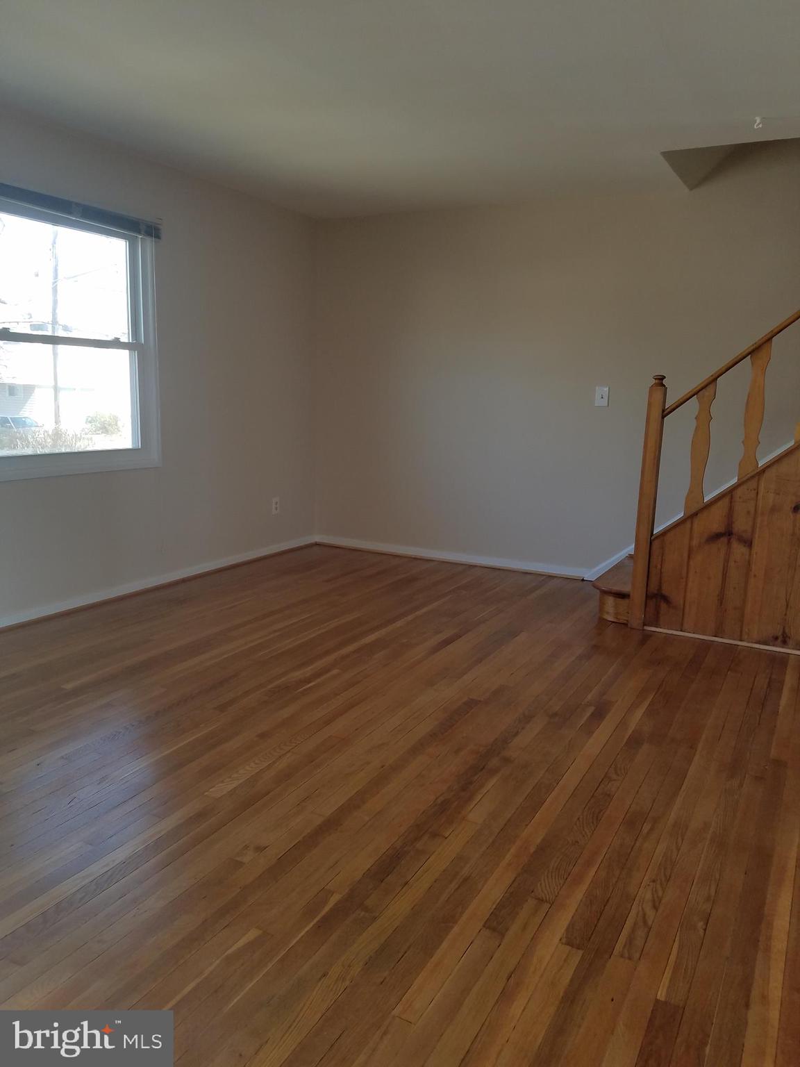 12021 Centerhill Street Silver Spring, MD 20902 - Photo 2 of 19 Spacious Living Room with hardwood floors