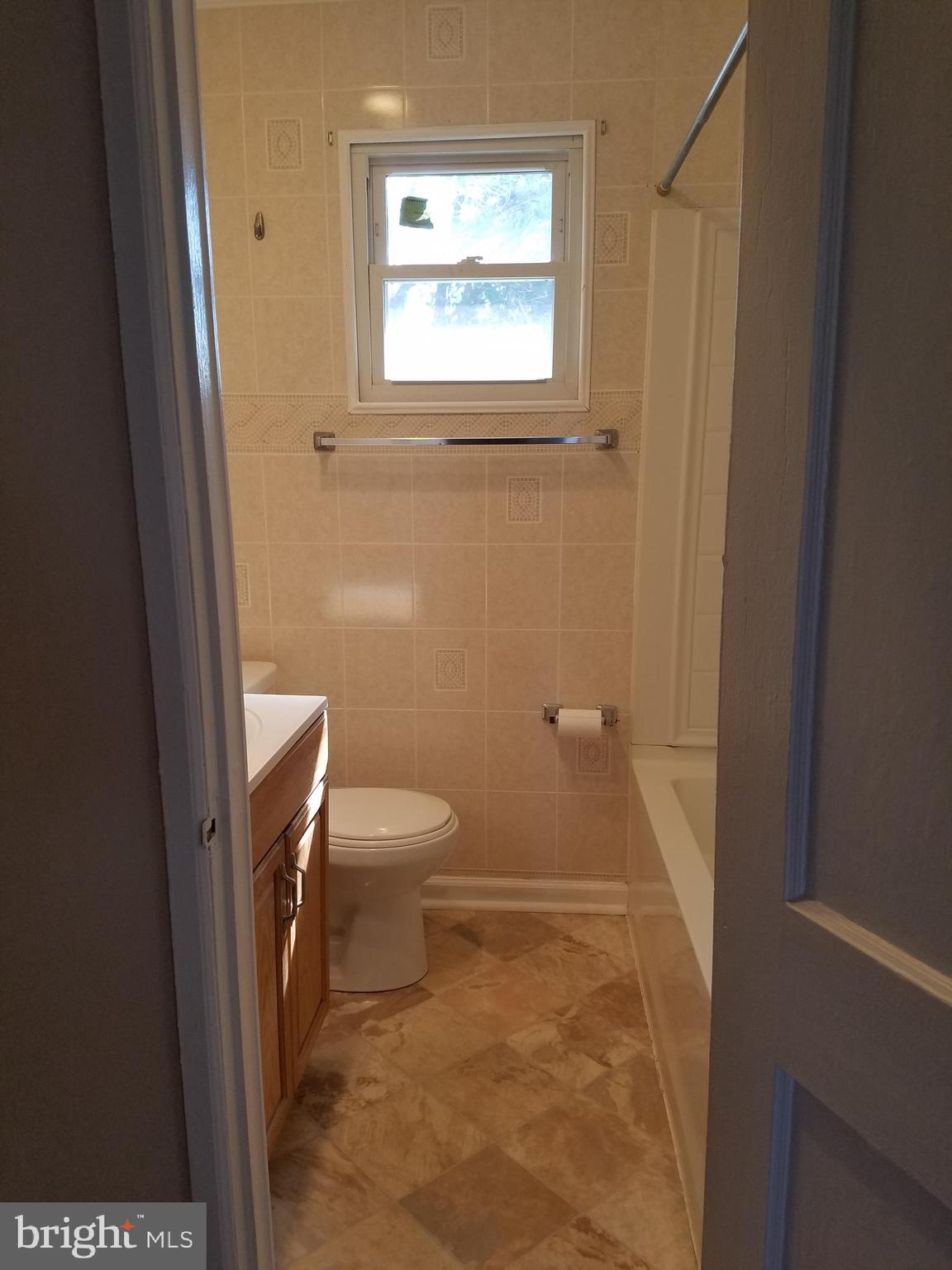 12021 Centerhill Street Silver Spring, MD 20902 - Photo 12 of 19 Upper level updated bath