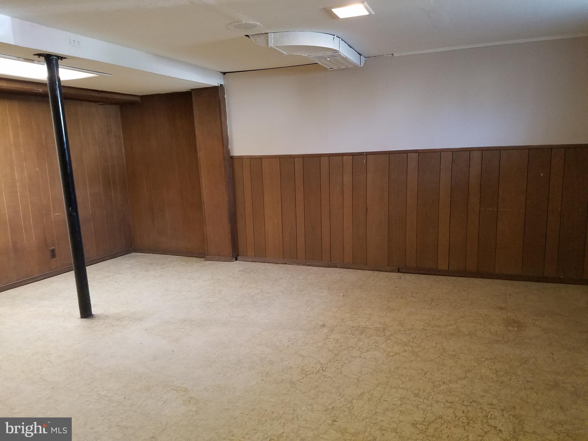 12021 Centerhill Street Silver Spring, MD 20902 - Photo 18 of 19 Finished Lower Level with walkout to backyard