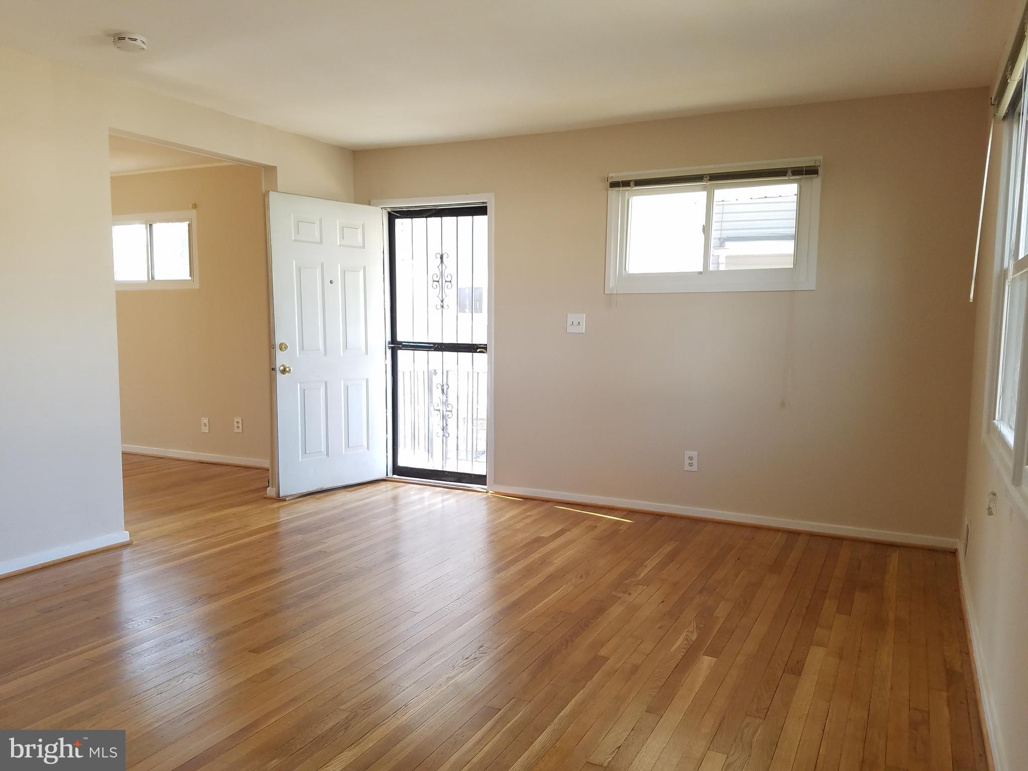 12021 Centerhill Street Silver Spring, MD 20902 - Photo 4 of 19 Living room view of main entrance