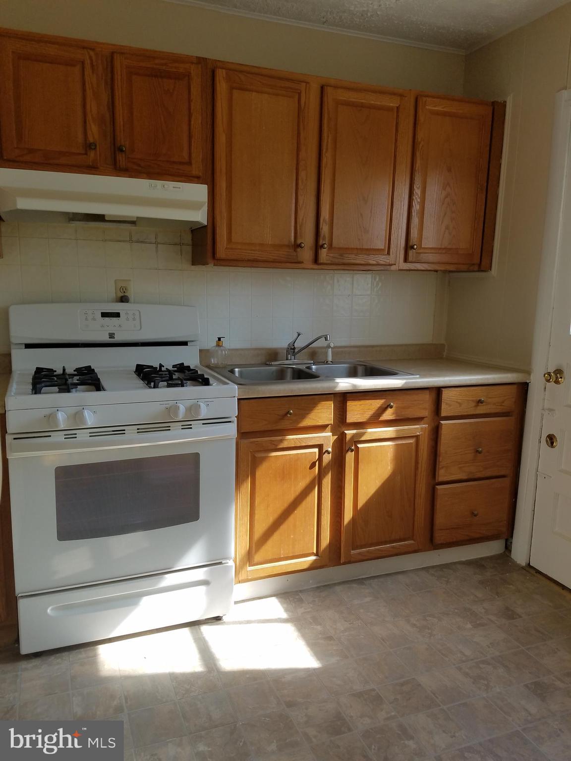 12021 Centerhill Street Silver Spring, MD 20902 - Photo 7 of 19 Kitchen with gas stove