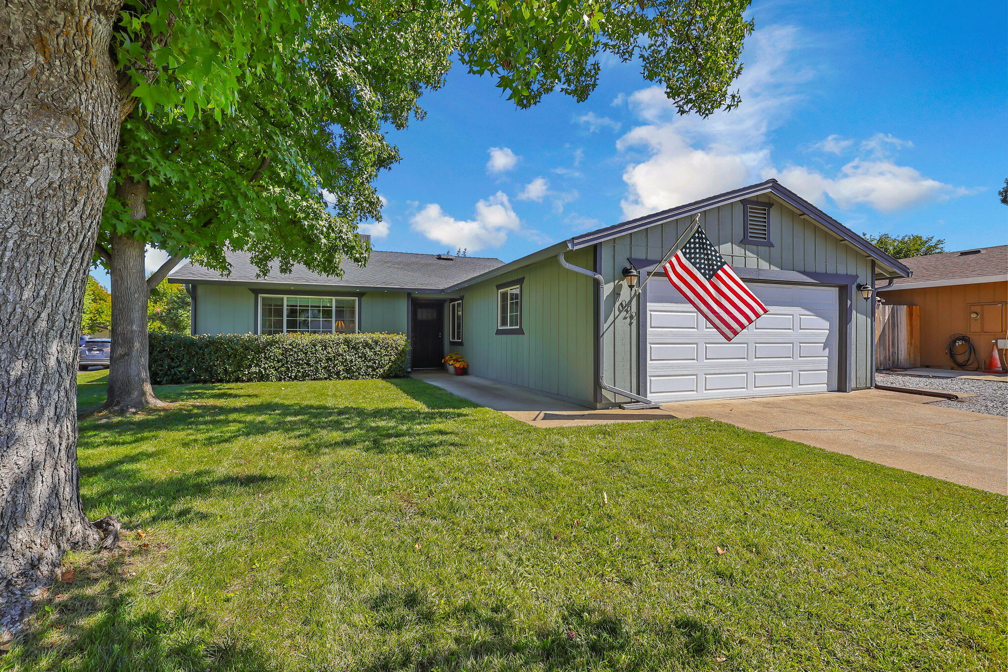 7022 Marvin Trail Redding, CA 96001 - Photo 1 of 27 a view of an house with backyard space and balcony