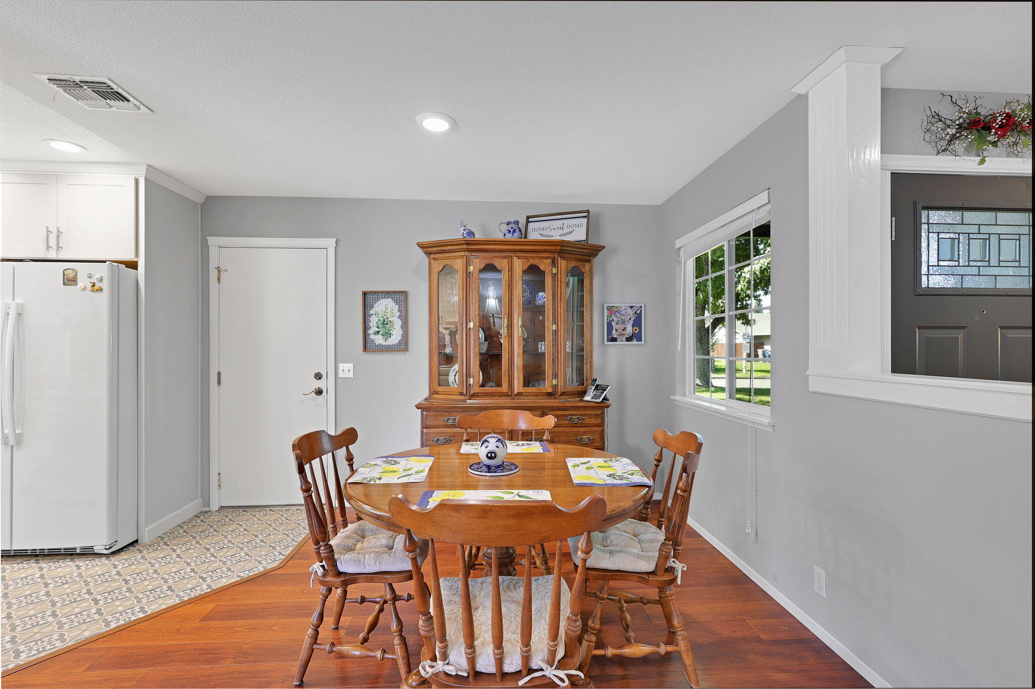 7022 Marvin Trail Redding, CA 96001 - Photo 11 of 27 a view of a dining room with furniture window and wooden floor