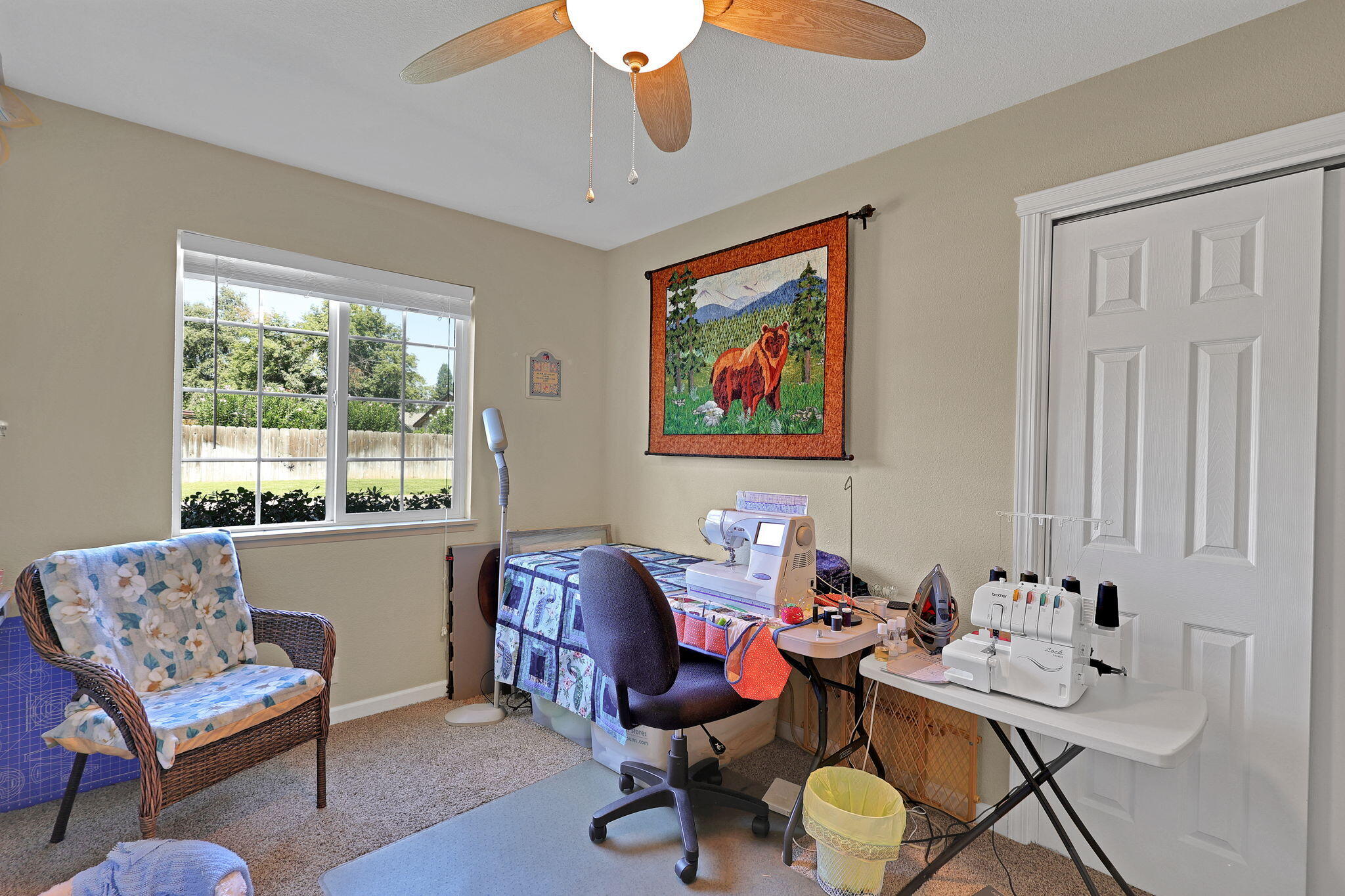 7022 Marvin Trail Redding, CA 96001 - Photo 21 of 27 a living room with furniture and a window