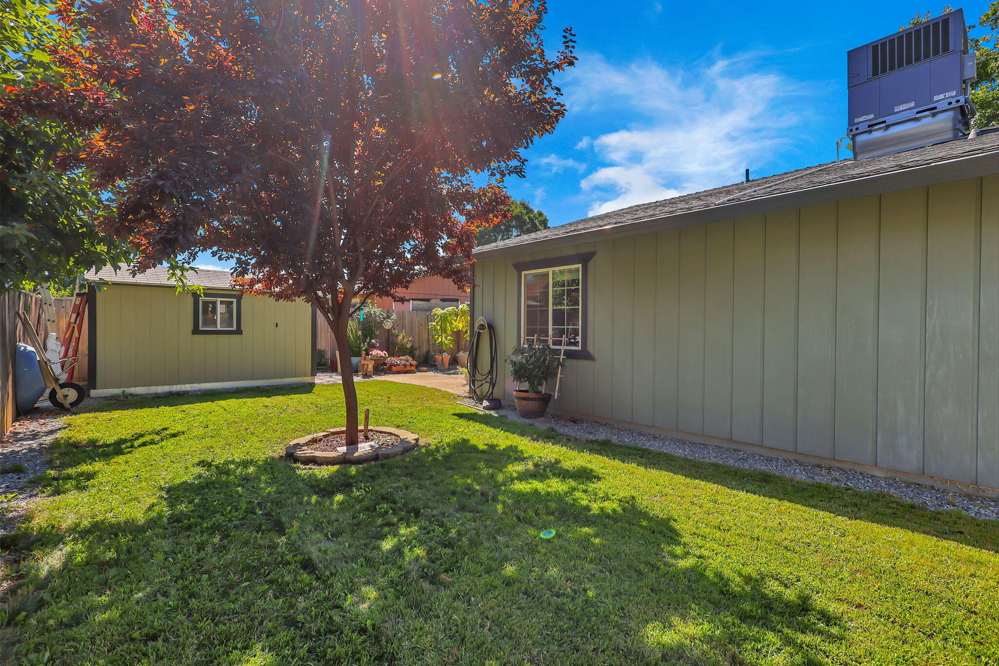 7022 Marvin Trail Redding, CA 96001 - Photo 25 of 27 a swimming pool with outdoor seating and yard