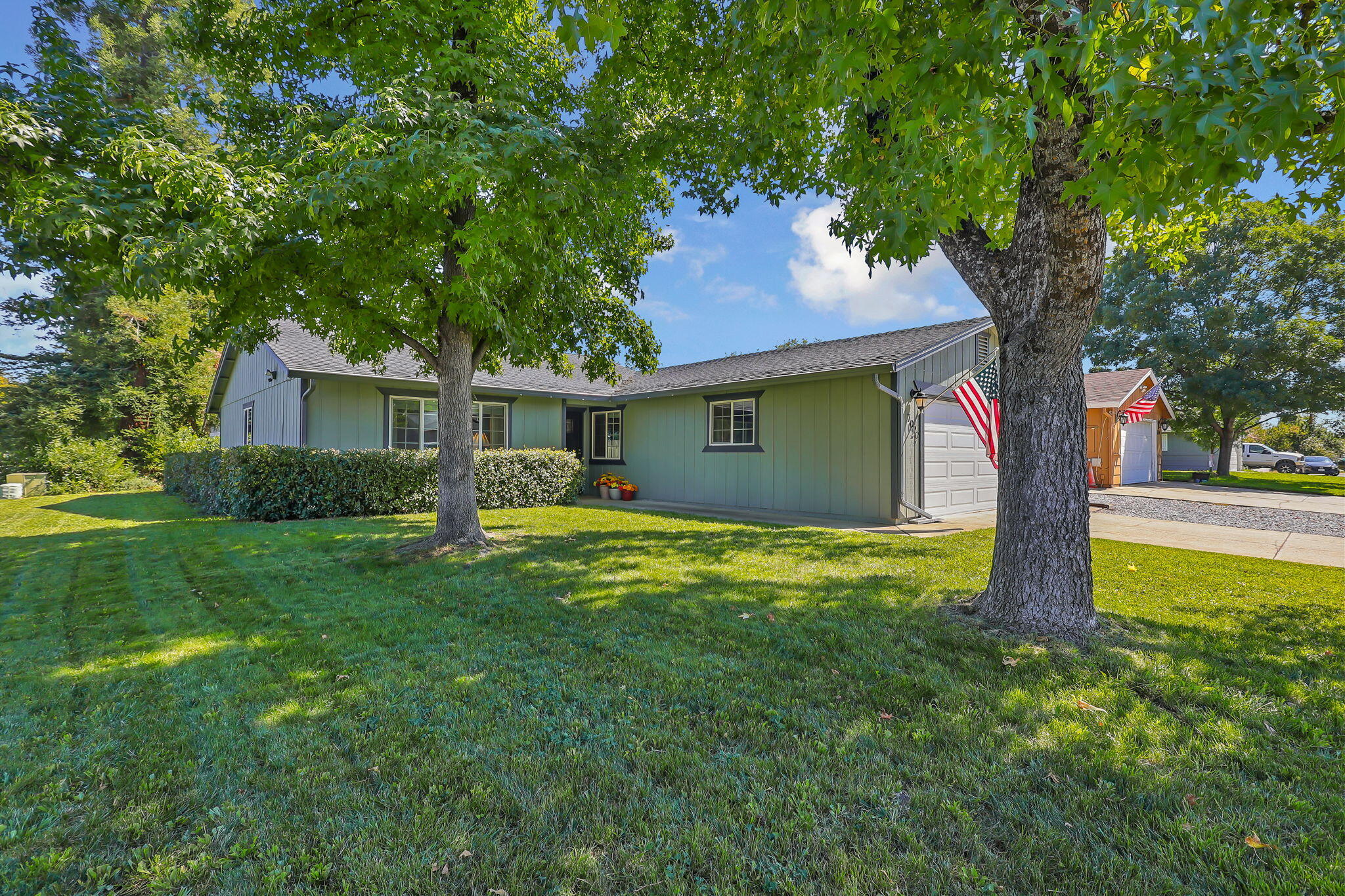 7022 Marvin Trail Redding, CA 96001 - Photo 3 of 27 a house view with a garden space