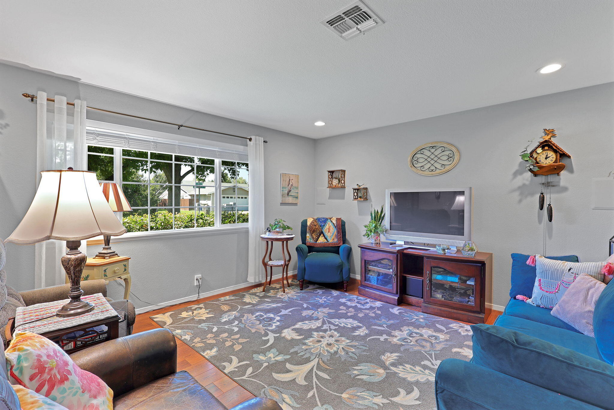 7022 Marvin Trail Redding, CA 96001 - Photo 5 of 27 a living room with furniture and a flat screen tv