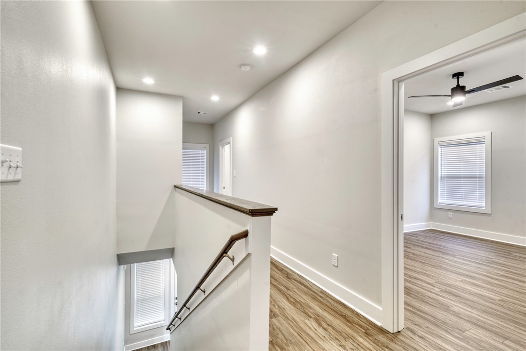 305 Cooner Street, Unit A College Station, TX 77840 - Photo 23 of 35 a view of a hallway with a chandelier