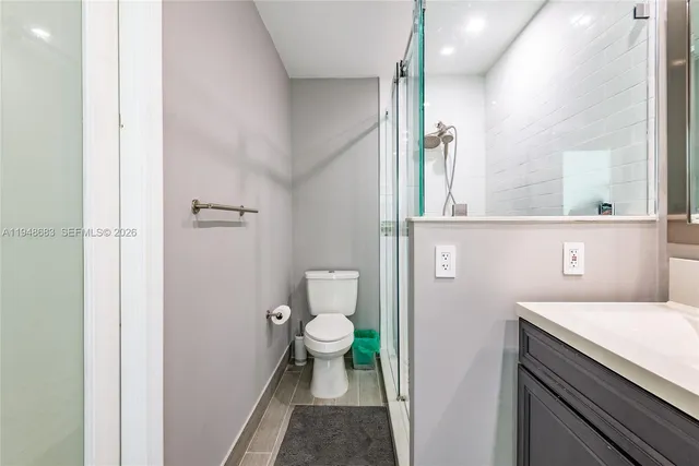a bathroom with a sink and a toilet