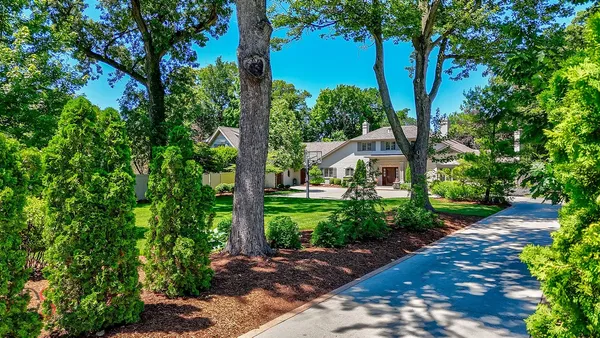 a front view of a house with a porch