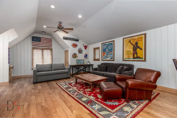 a view of backyard with furniture and garden