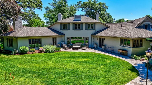 a view of balcony with wooden floor and outdoor seating