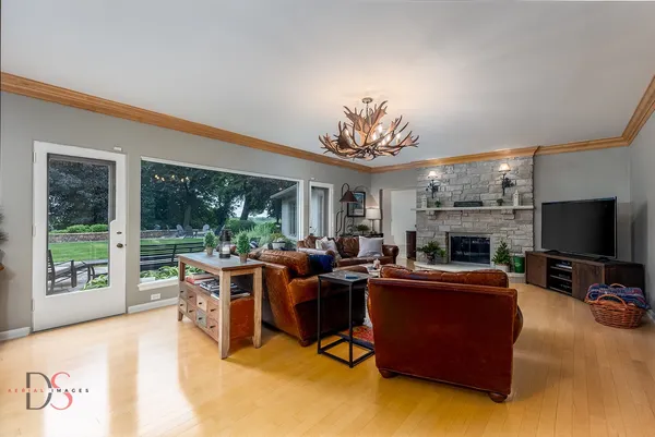 a kitchen with stainless steel appliances granite countertop a stove and a microwave