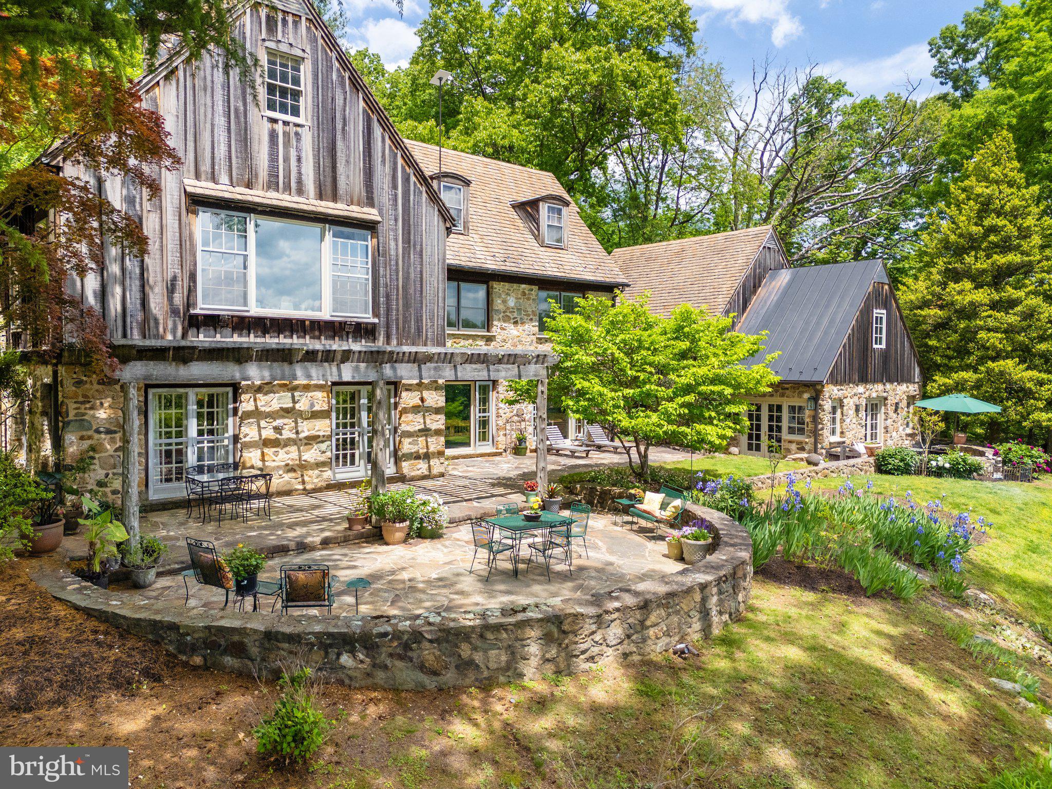 4392 Carrington Road Markham, VA 22643 - Photo 33 of 59 Multiple stone terraces along the back of house