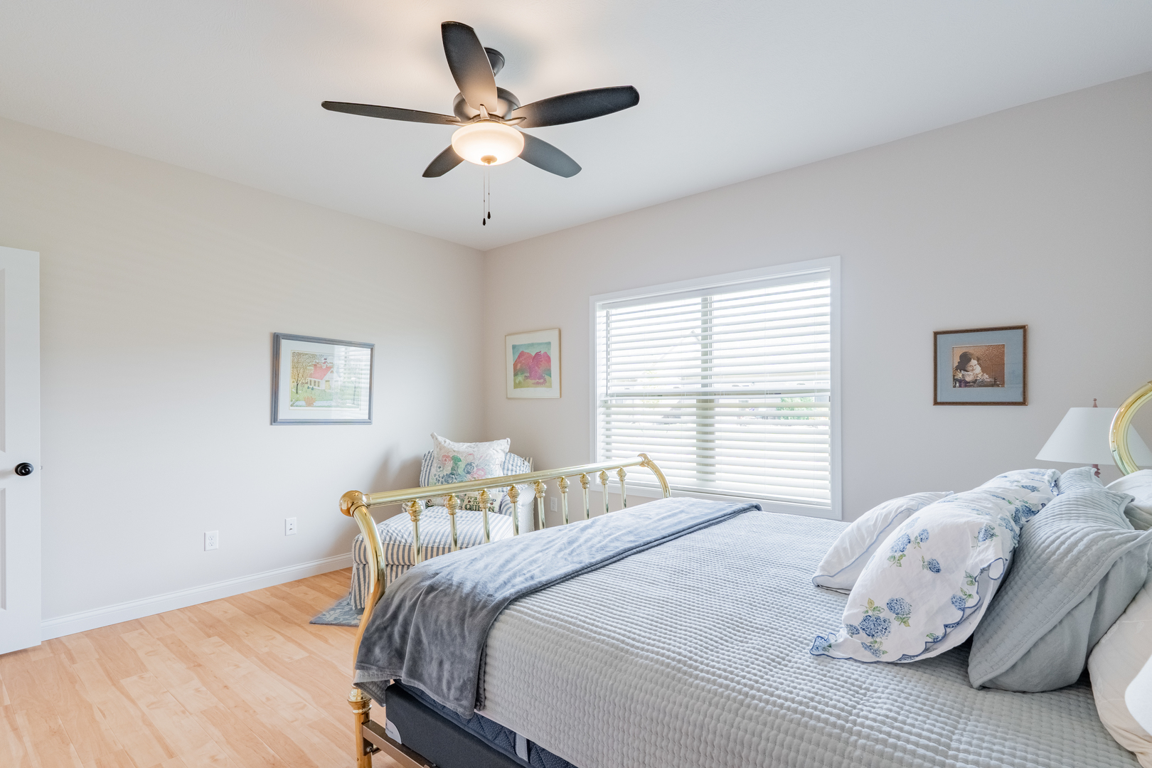 1906 Dunraven Road Bloomington, IL 61704 - Photo 15 of 28 a bedroom with a bed and a window