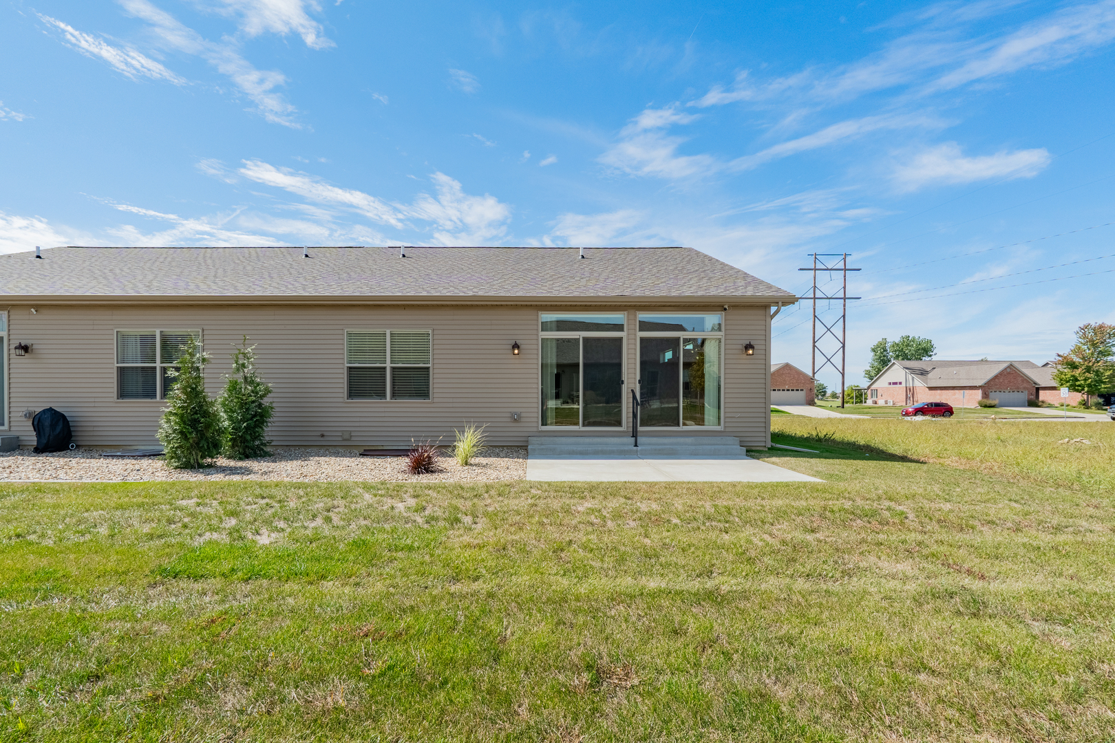 1906 Dunraven Road Bloomington, IL 61704 - Photo 22 of 28 a house view with a garden space