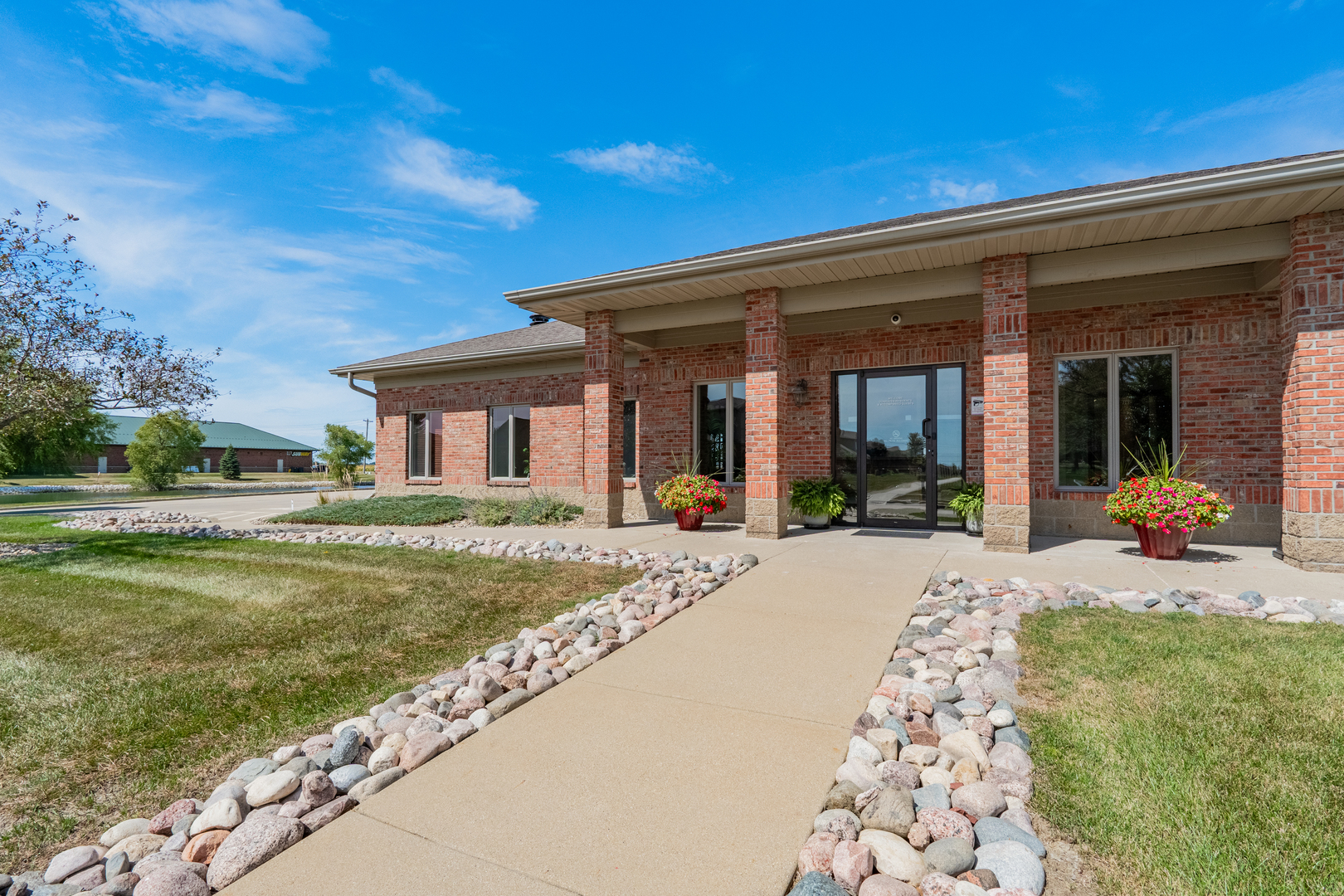 1906 Dunraven Road Bloomington, IL 61704 - Photo 25 of 28 a view of a house with backyard patio and garden