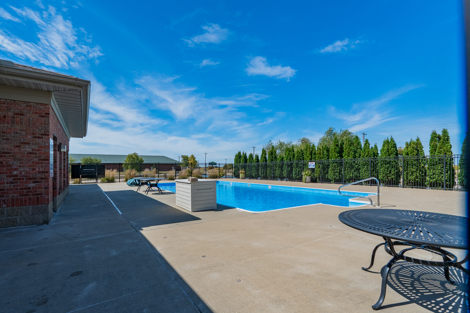1906 Dunraven Road Bloomington, IL 61704 - Photo 26 of 28 a view of a swimming pool with seating area