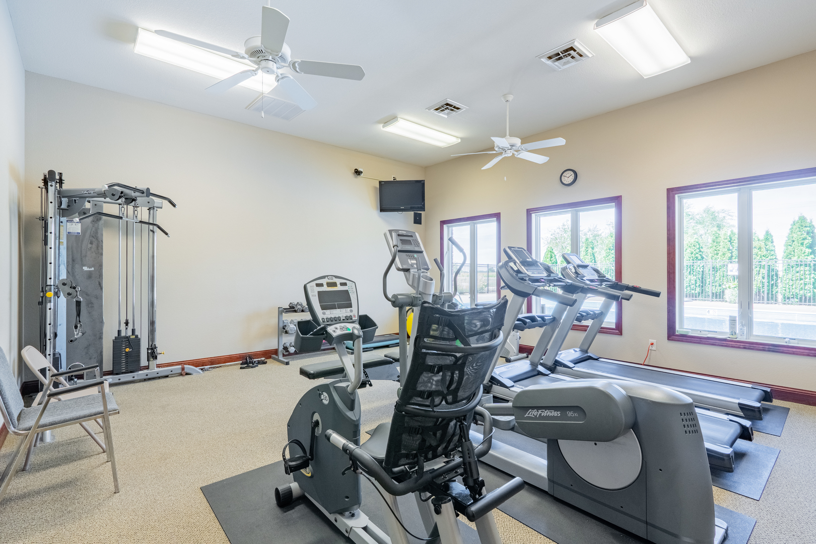 1906 Dunraven Road Bloomington, IL 61704 - Photo 27 of 28 a view of a room with gym equipment