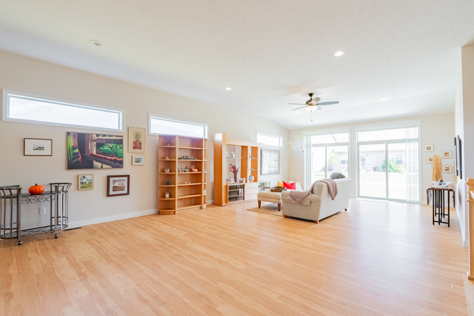1906 Dunraven Road Bloomington, IL 61704 - Photo 7 of 28 a living room with furniture window and wooden floor