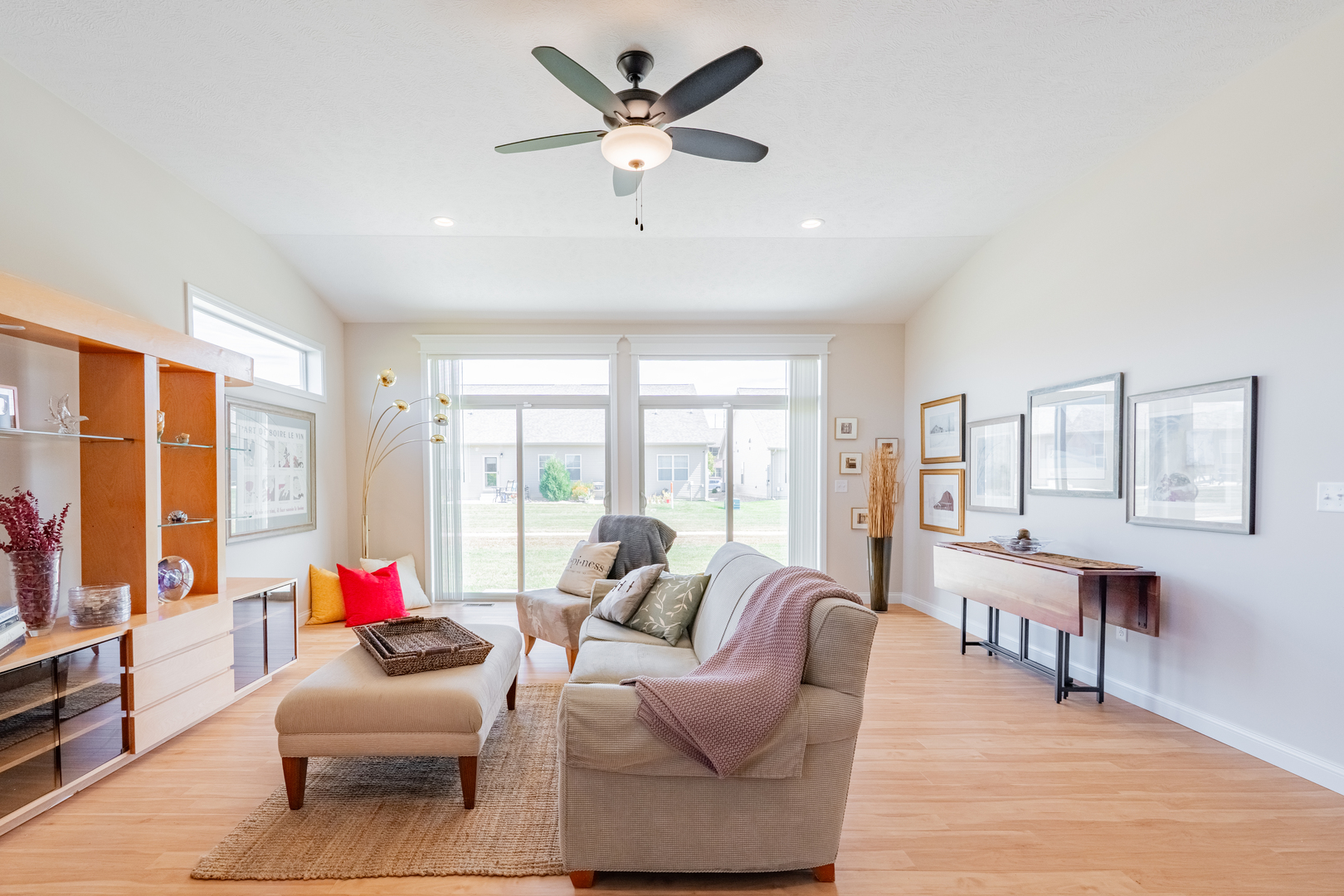 1906 Dunraven Road Bloomington, IL 61704 - Photo 9 of 28 a living room with furniture and a large window with wooden floor