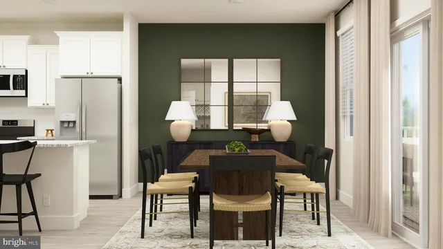 a living room with furniture a lamp and a potted plant