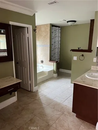 a view of room with stairs and shelf