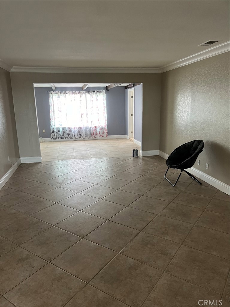 19260 Santa Rosa Mine Road Perris, CA 92570 - Photo 17 of 22 a view of an empty room with a window