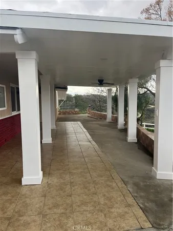 a view of a hallway view with staircase