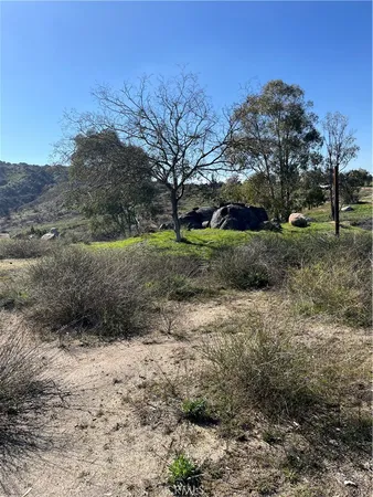 a view of a large pool with a yard
