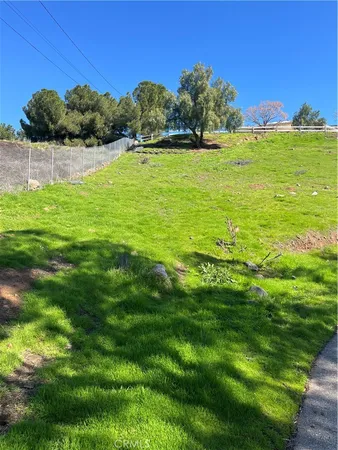 a view of a yard with an outdoor space