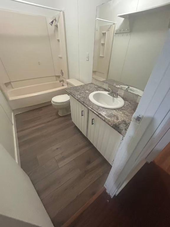 23393 Nameless Road, Unit 123 Leander, TX 78641 - Photo 13 of 15 a bathroom with a granite countertop sink and a mirror