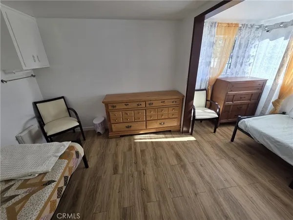 a bedroom with furniture