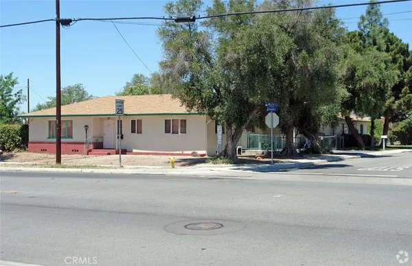 a view of a house with a street