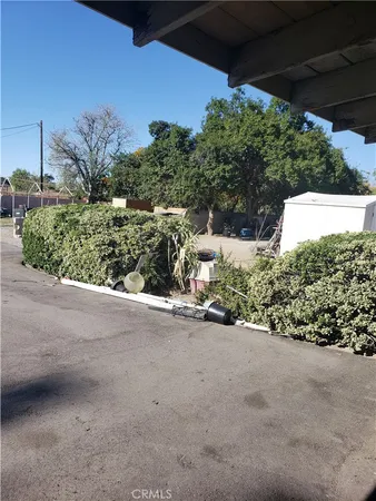 a view of a house with a street