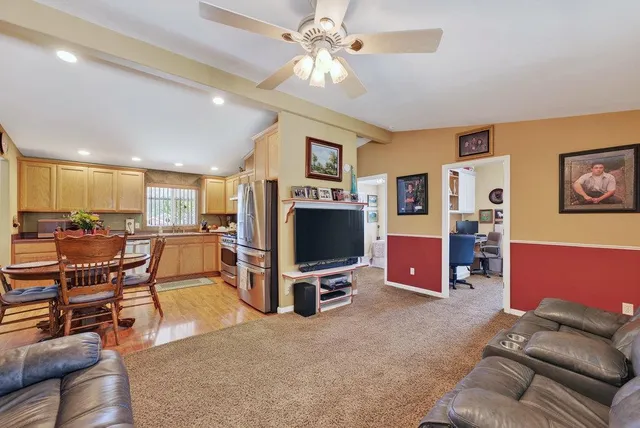 a view of outdoor space with playground and green space