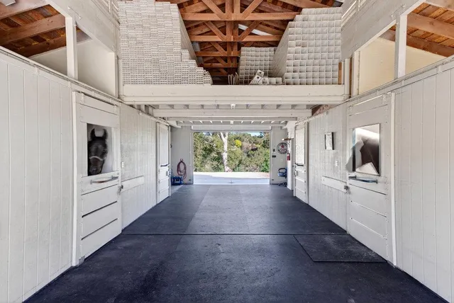 an aerial view of a house with a garden