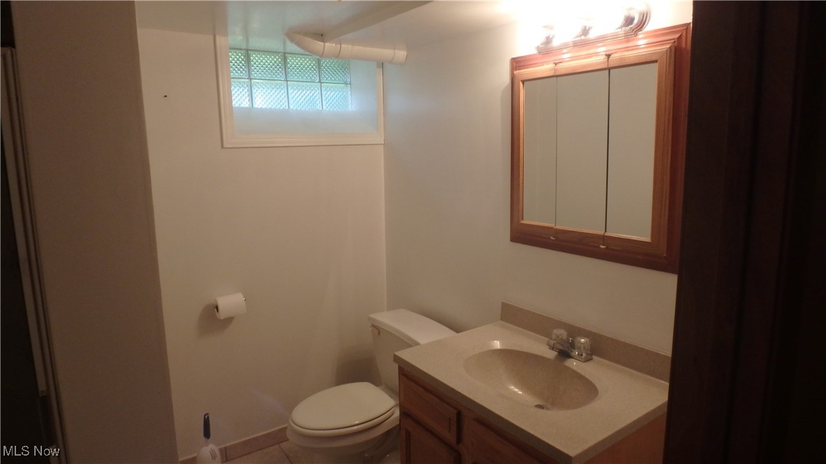 2901 Dentzler Road Parma, OH 44134 - Photo 21 of 25 Bathroom with toilet and vanity