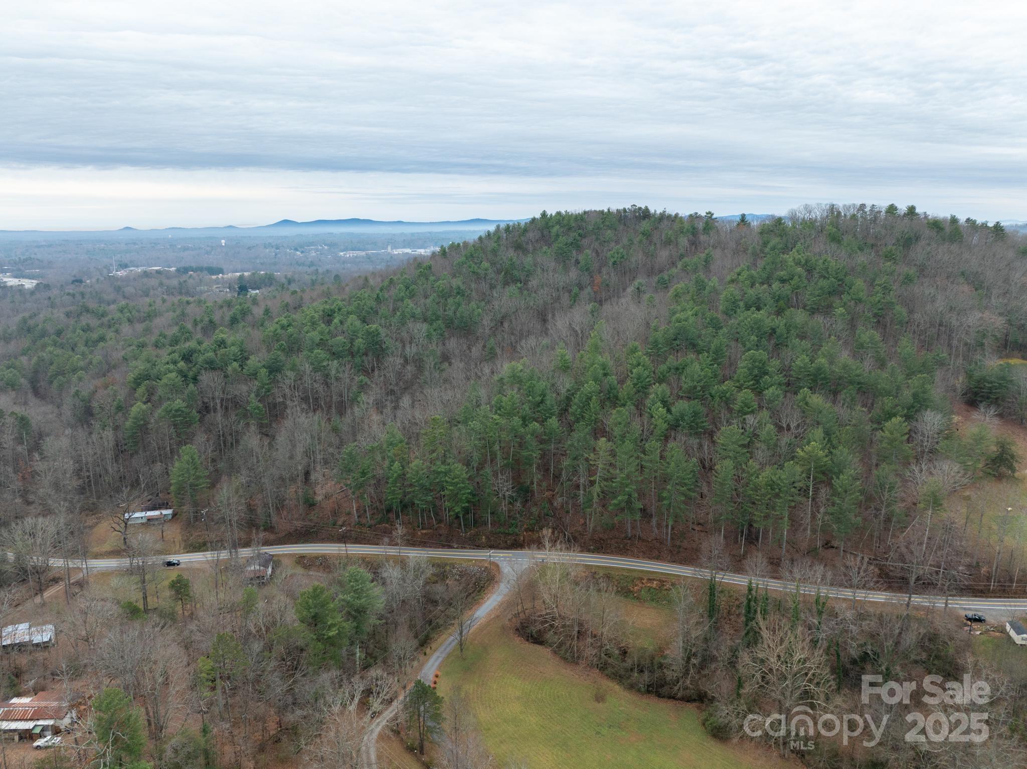 1864 Starcross Road Lenoir, NC 28645 - Photo 3 of 17 a view of a field of mountains and valleys in the background