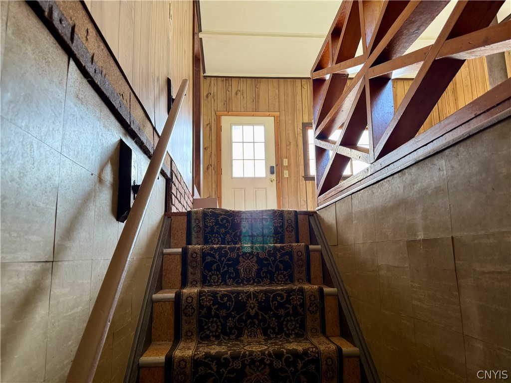 7928 Morgan Road Clay, NY 13090 - Photo 23 of 39 stairs from great room to basement