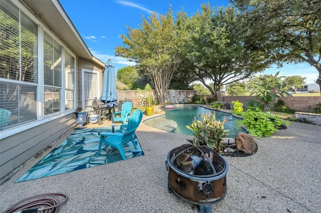 a garden view with a seating space